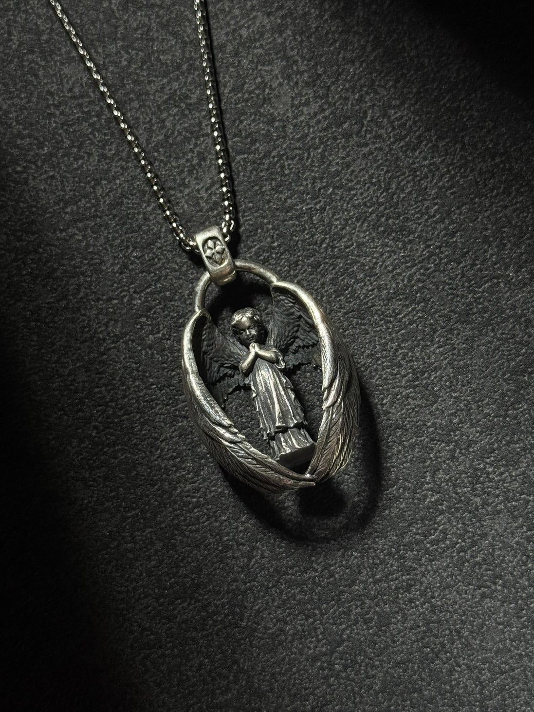sterling silver guardian angel pendant necklace with protective wing design