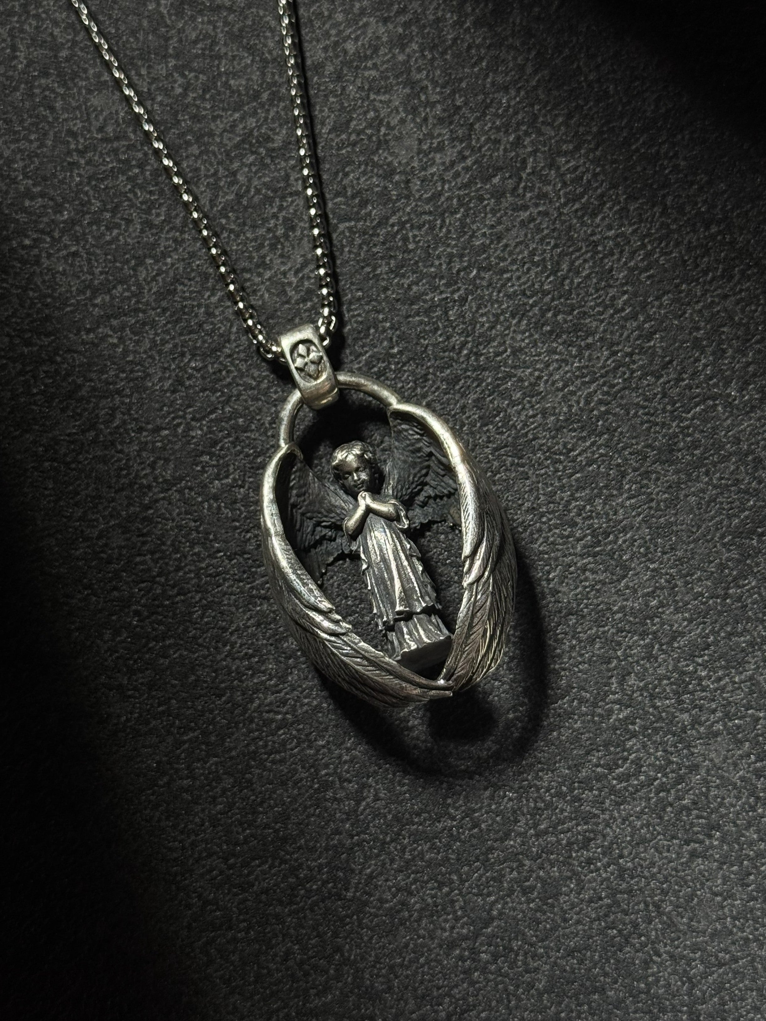 sterling silver guardian angel pendant necklace with protective wing design