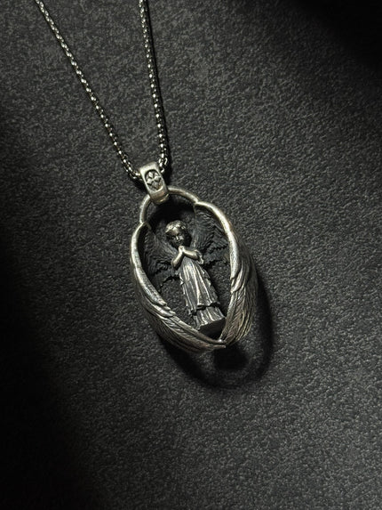 sterling silver guardian angel pendant necklace with protective wing design