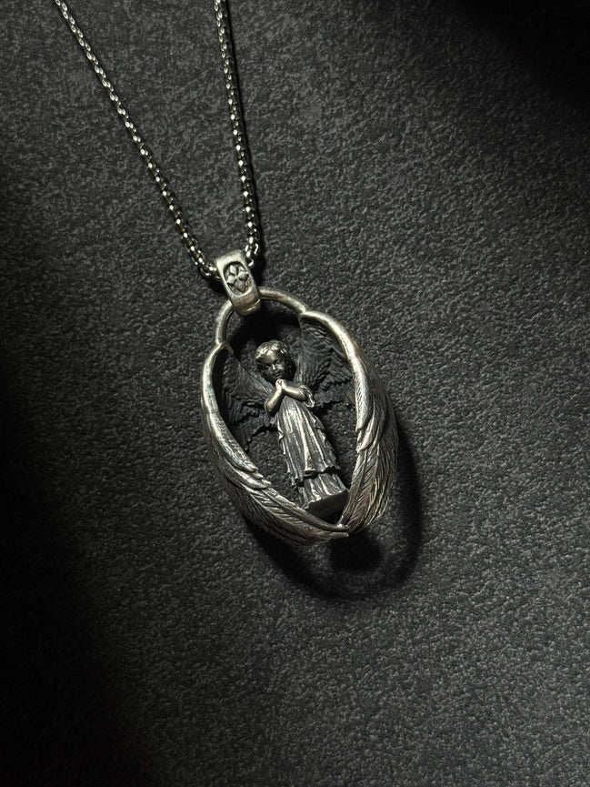 sterling silver guardian angel pendant necklace with protective wing design