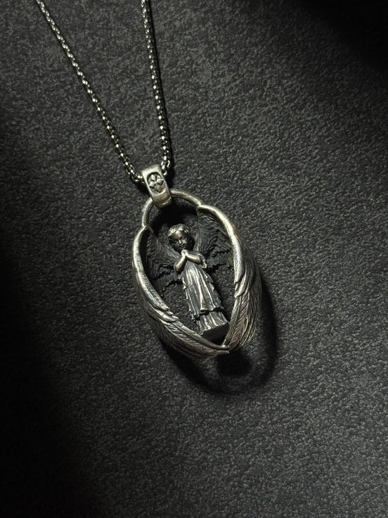 sterling silver guardian angel pendant necklace with protective wing design