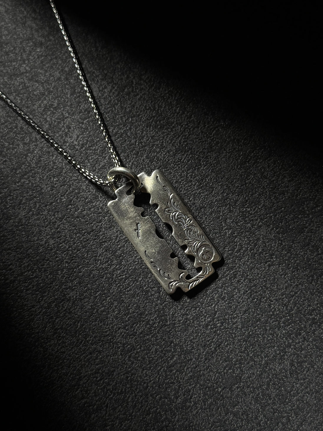 Handcrafted sterling silver razor blade pendant necklace with vintage engraved details