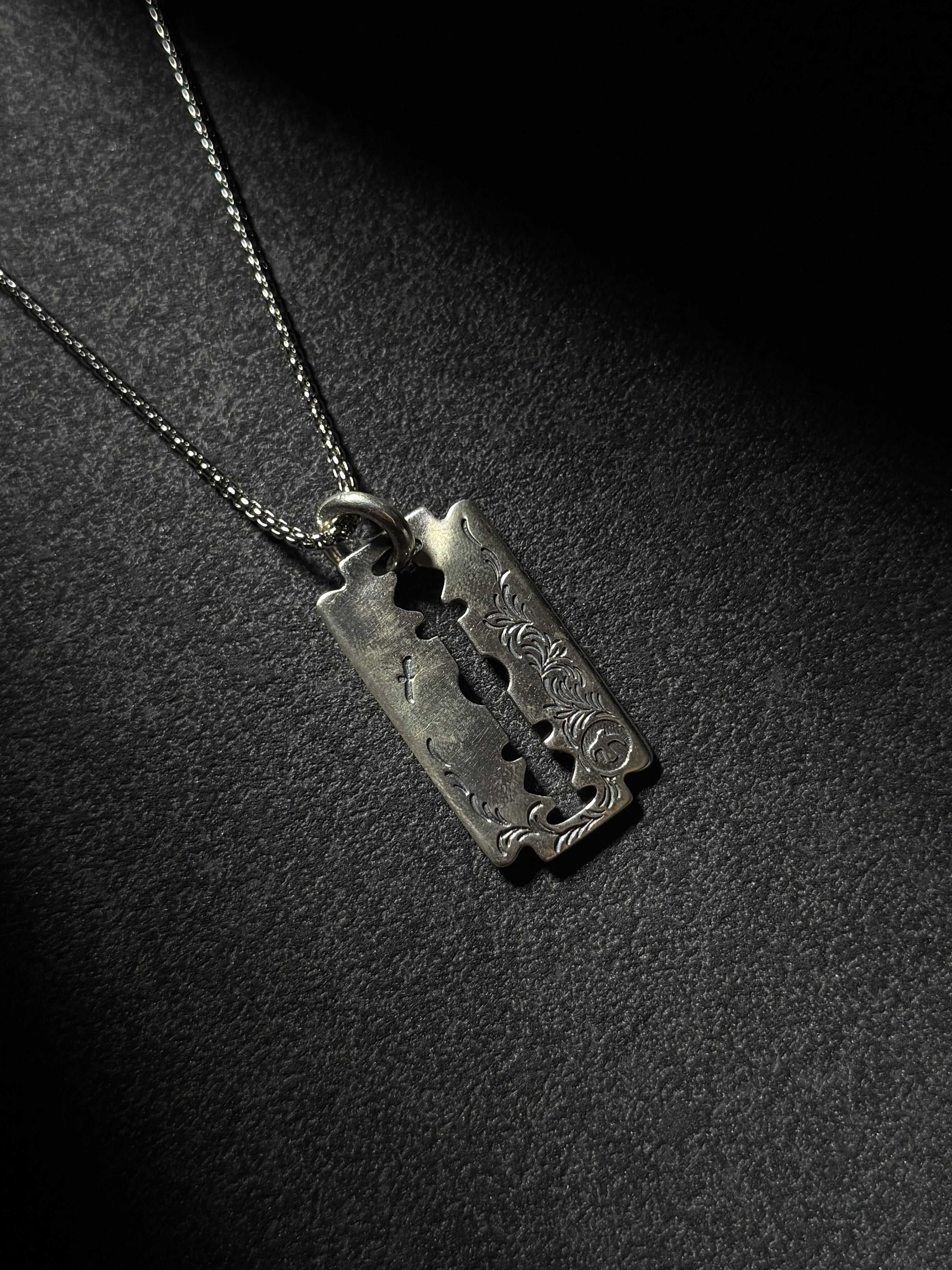 Handcrafted sterling silver razor blade pendant necklace with vintage engraved details
