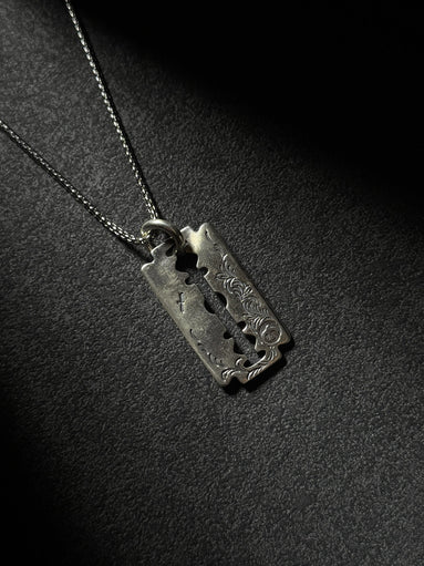 Handcrafted sterling silver razor blade pendant necklace with vintage engraved details