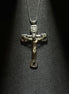 Sterling silver crucifix pendant necklace featuring a detailed Jesus cross design