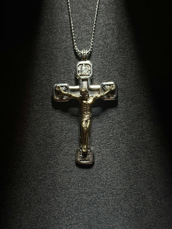 Sterling silver crucifix pendant necklace featuring a detailed Jesus cross design