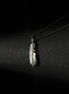 Handcrafted oxidized sterling silver feather pendant necklace with engraved feather details.